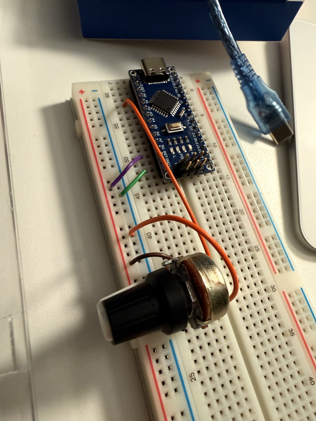 Arduino Nano and potentiometer wired on a breadboard