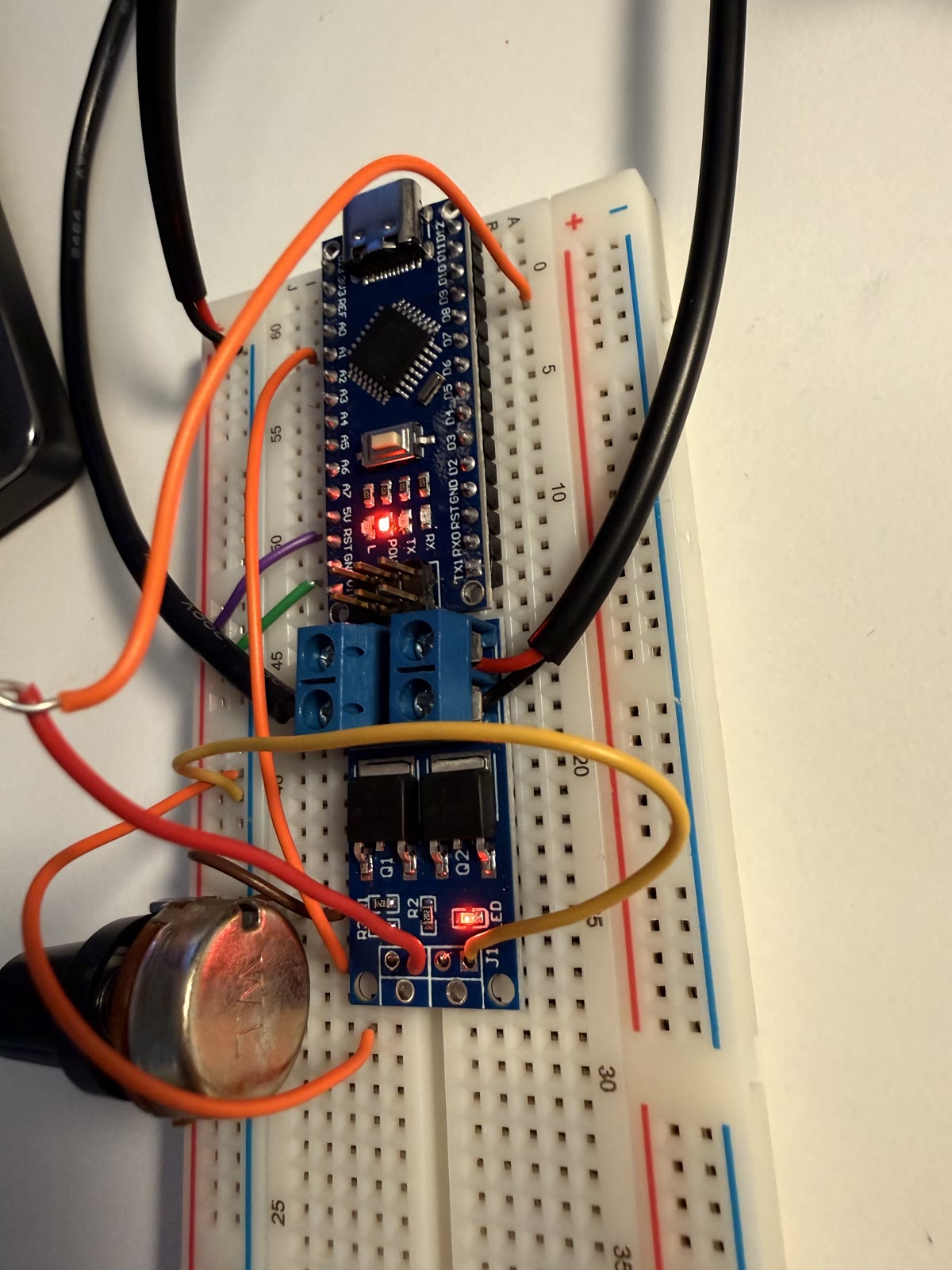 Completed breadboard circuit with Nano, potentiometer, MOSFET, and jumper wires